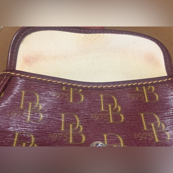 Dooney & Bourke Burgundy Signature
Leather & Canvas Flap Wristlet - Picture 5 of 8